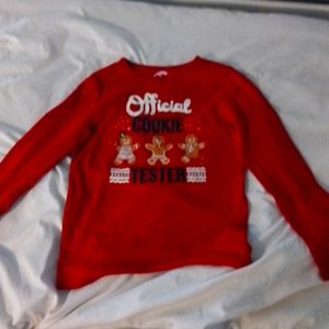A long sleeve Christmas shirt.